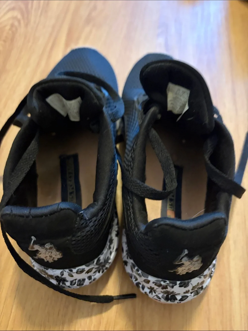 U.S. Polo Assn. Women’s Black Sneakers with Pink Toe Accent